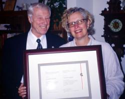Charles Garrad receiving the Margaret & James Pendergast Award from past-president Dr. Mima Kapches Charles Garrad receiving the Margaret & James Pendergast Award