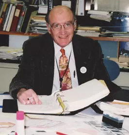 E. Leigh Syms